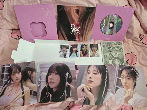 Selling QWER's 1st album.