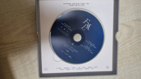 Selling Seventeen's FML mini album (gray version).