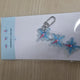 TXT compass logo keyring for sale