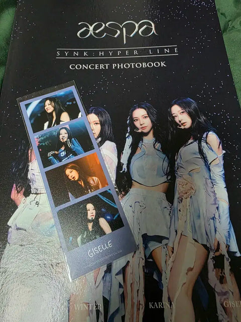 Selling aespa's first concert photobook.