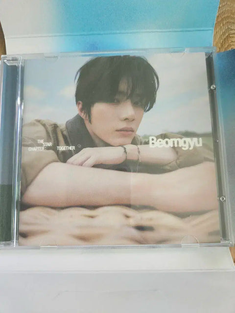 Selling TXT open albums.
