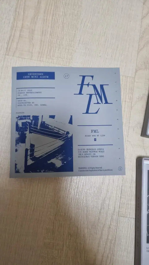 Selling Seventeen's FML mini album (gray version).