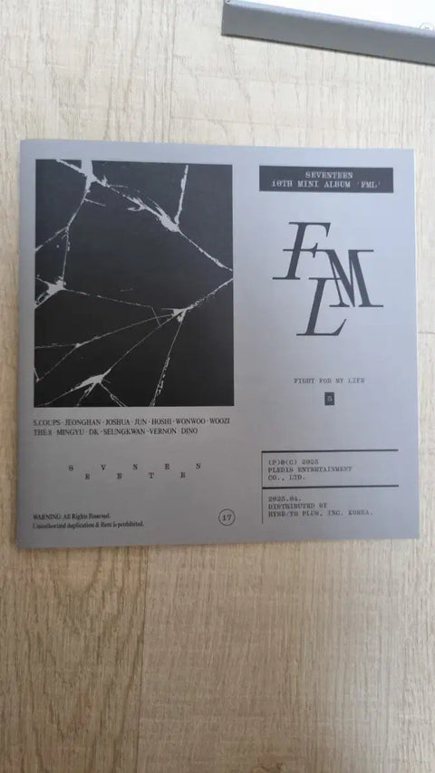 Selling Seventeen's FML mini album (gray version).