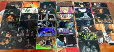 Selling 34 Demon Slayer cards as a set.