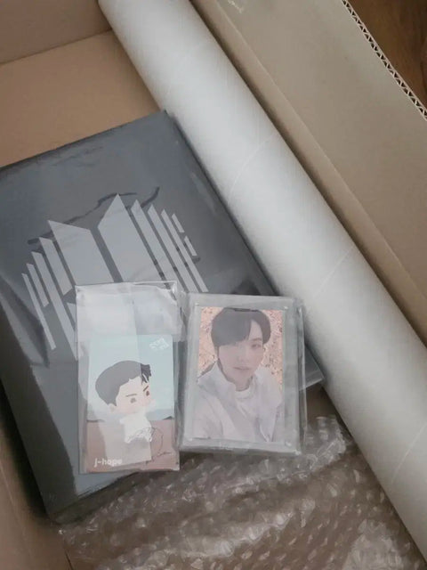 Selling BTS Proof album, includes poster and special gifts.