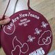 NewJeans burgundy round bag