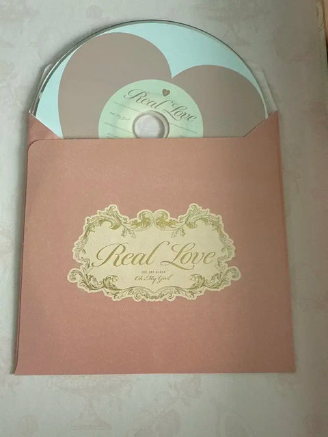 Selling Oh My Girl Real Love album.