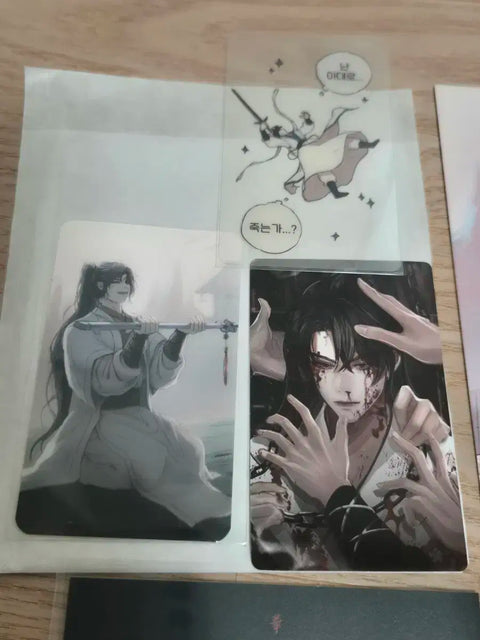 Selling unofficial Return of Mount Hua Sect postcards and photo cards.