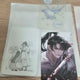 Selling unofficial Return of Mount Hua Sect postcards and photo cards.