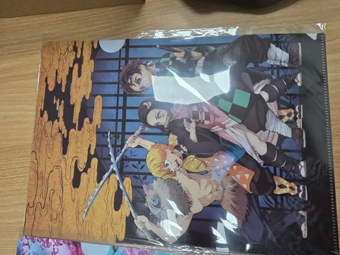 Selling Demon Slayer pop-up store exclusive photobook.