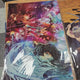 Selling Demon Slayer pop-up store exclusive photobook.