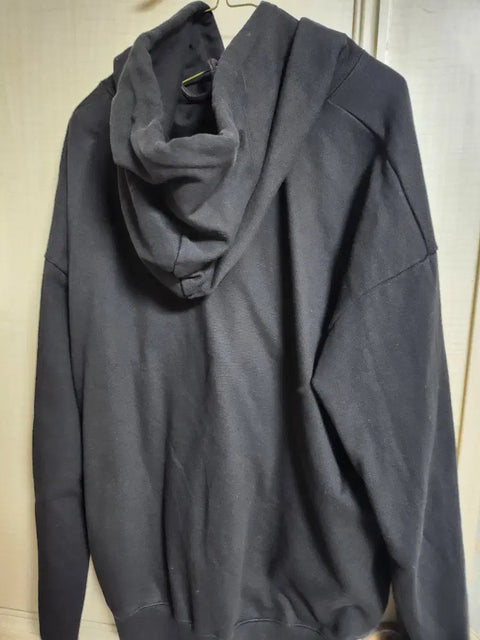 Selling an Isegye Idol pop-up store black hoodie.